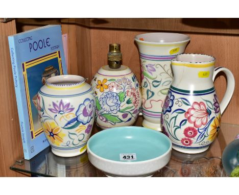 FIVE PIECES OF POOLE POTTERY AND A BOOK 'COLLECTING POOLE POTTERY' BY ROBERT PRESCOTT-WALKER, the pottery comprising a floral