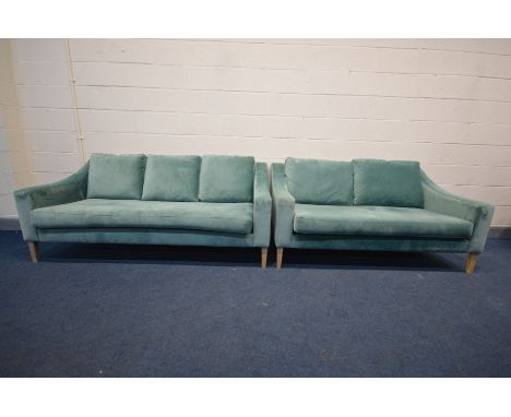 A HEAL'S TWO PIECE LOUNGE SUITE, Richmond range, in smart velvet seafoam upholstery, comprising a three seater sofa, length 1