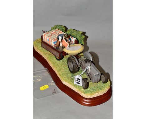 A BORDER FINE ARTS TRACTORS SERIES SCULPTURE 'TOP DRESSING', model No. A6349, mounted on a wooden plinth with title label to 