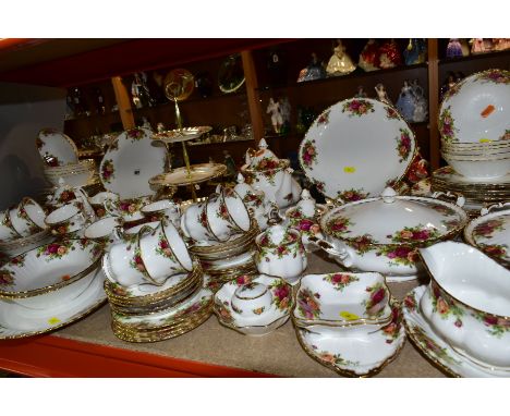 ROYAL ALBERT 'OLD COUNTRY ROSES' PART DINNER SERVICE, comprising eighteen teacups (seven seconds, one chipped), twenty one sa