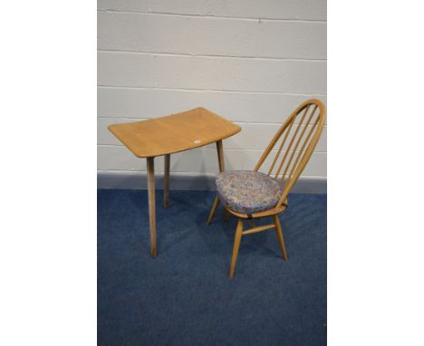 AN ERCOL ELM AND BEECH MODEL 265 TABLE, the curved top on triple square tapered legs, width 68cm x depth 50cm x height 74cm a