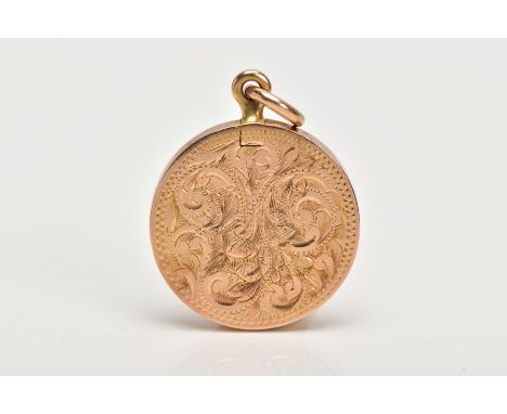 A YELLOW METAL LOCKET PENDANT, of a circular form, engraved foliate design to the front, set with a single split pearl to the