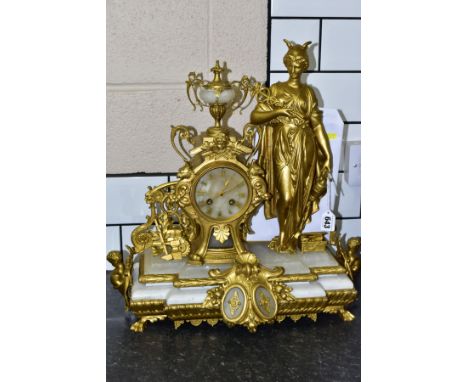 A MID 19TH CENTURY FRENCH GILT METAL, ALABASTER AND FIGURAL MANTEL CLOCK, the female figure wearing winged helmet holding a p