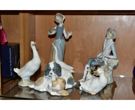 TWO LLADRO FIGURES AND THREE NAO FIGURES, comprising 1052 'Girl with Duck', designed by Vincente Martinez, issued 1970-1998, 