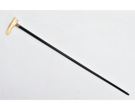 A MID-VICTORIAN IVORY HANDLED WALKING STICK, black cane, carved ivory handle with a silver collar hallmarked London 1882, mak