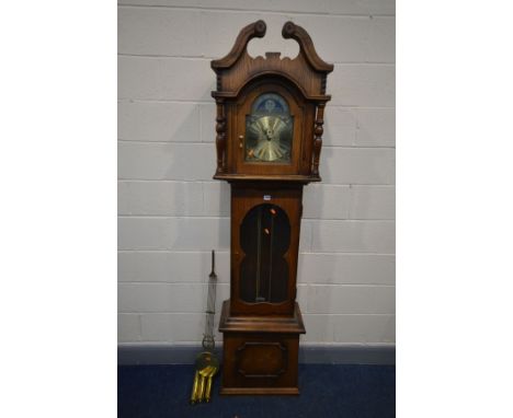 A MODERN OAK CHIMING LONGCASE CLOCK, swan neck pediment to hood, arch glazed door enclosing a brassed 8 inch dial, moonphase 