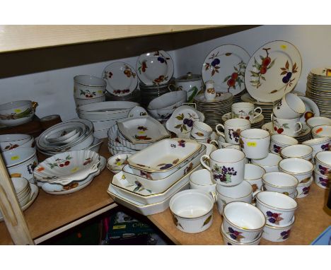 A QUANTITY OF ROYAL WORCESTER 'EVESHAM' DINNER, TEA AND COOKWARE, comprising of a twin handled casserole and cover, 17cm high