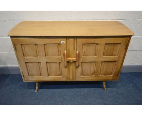 AN ERCOL 1950'S ELM AND BEECH DOUBLE DOOR SIDEBOARD, with panelled doors and sides, on turned legs, width 124cm x depth 45cm 