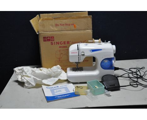 A SINGER MODEL 117 FEATHERWEIGHT 2 SEWING MACHINE with foot pedal, accessories, manual, and box