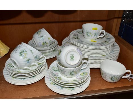 A MINTON SPRING VALLEY PATTERN PART DINNER SERVICE FOR MOSTLY EIGHT PLACE SETTINGS, mostly seconds, comprising eight tea cups