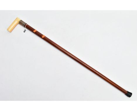 A LATE VICTORIAN WALKING STICK, the wooden stick (believed to be Malacca) with plain banded silver collar and simple ivory ha