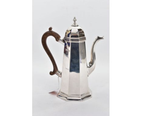 A GEORGE V SILVER COFFEE POT, of a plain polished tapered, octagonal form, with a hinged dome cover and a baluster finial, sc