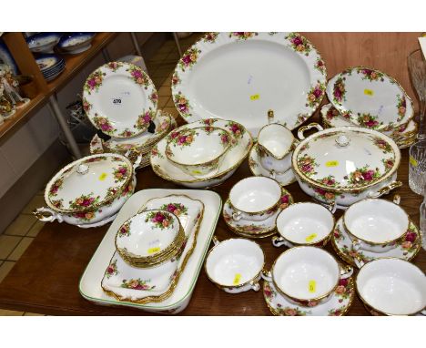 A ROYAL ALBERT OLD COUNTRY ROSES DINNER SERVICE, firsts and seconds, two twin handled tureens and covers, (firsts), an oval m