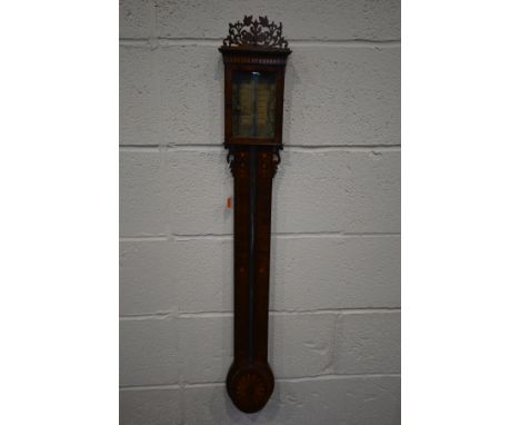 A GEORGE IV MAHOGANY AND INLAID CISTERN STICK BAROMETER, with carved fretwork above a single door enclosing the scale on pape