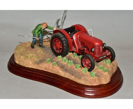 A BORDER FINE ARTS TRACTORS SERIES SCULPTURE 'TATTIE SPRAYING' (David Brown Tractor), model No. A5894, mounted on a wooden pl
