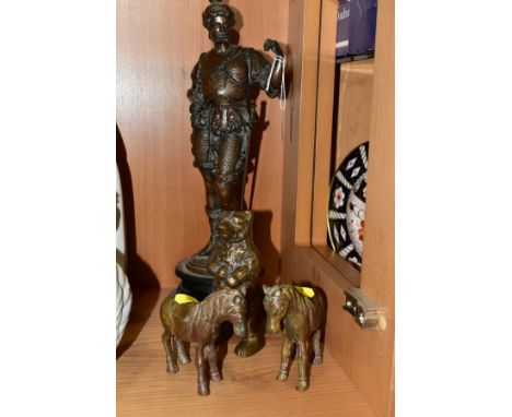 A GROUP OF FOUR BRONZES/BRONZED FIGURES, comprising a late 19th Century bronzed spelter figure of a Knight, mounted on a circ