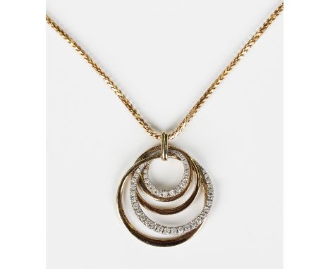 A 9ct two gold and diamond pendant in an openwork entwined circular design, mounted with rows of graduating circular cut diam