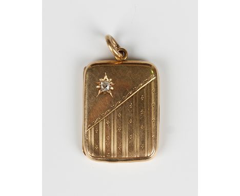 A 15ct gold and diamond rectangular pendant locket, the front star set with a cushion cut diamond, otherwise with engine turn