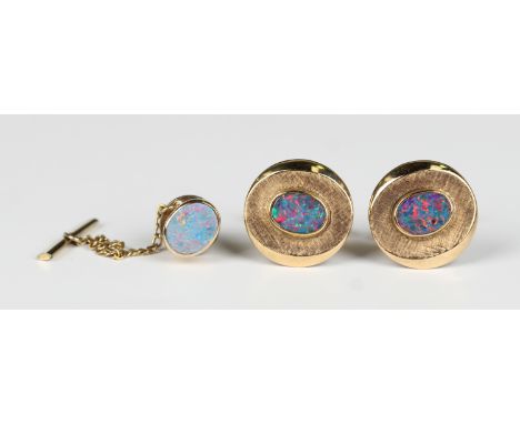 A pair of gold and opal doublet oval cufflinks with folding bar fittings, detailed '9ct', weight 9.4g, dimension of each fron