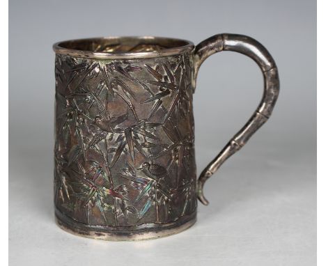 A late 19th/early 20th century Chinese silver christening tankard of slightly tapered cylindrical form with simulated bamboo 