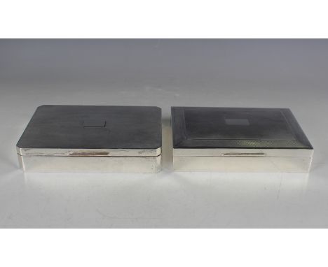 Two Elizabeth II silver rectangular cigarette boxes, each with an engine turned hinged lid, Birmingham 1960 by Alexander Clar