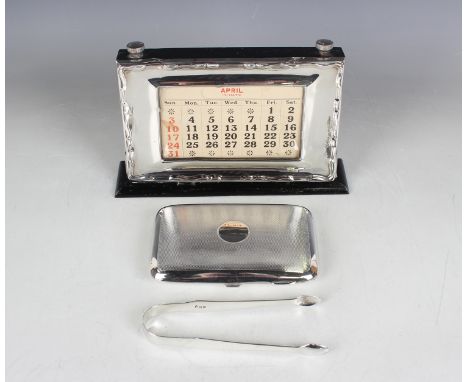 A George V silver curved rectangular cigarette case with engine turned decoration, Birmingham 1911 by A. &amp; J. Zimmerman L