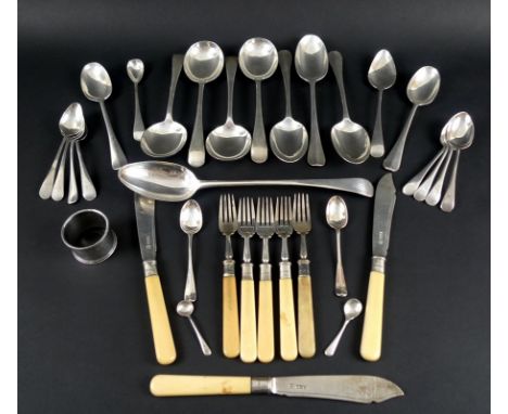 A collection of George III and later silver cutlery, mostly Old English pattern, including an Old English pattern serving spo