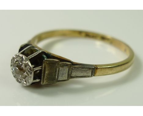 An 18ct gold and platinum ring with illusion set diamond, approx 0.1ct, size P, 2.5g.