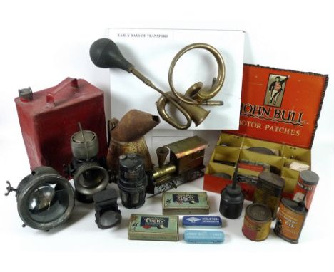 Petroliana: a collection early to mid 20th century car and transportation items, including an Esso red oil can, two brass car