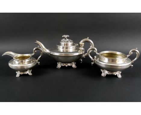 An early Victorian harlequin silver tea service comprising teapot with reeded bands to the body, the lid with briar rose fini