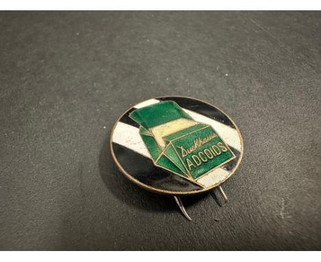 A Duckham's Adcoids enamel lapel badge by Marples &amp; Beasley.