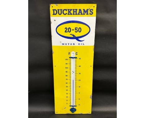 A Duckham's 20-50 Motor Oil enamel thermometer, 13 x 36".