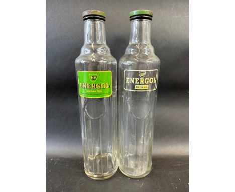 Two variations of BP Energol quart glass bottles.