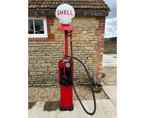 A Bowser hand-operated petrol pump, restored, with hose, nozzle and reproduction plastic petrol pump globe. 