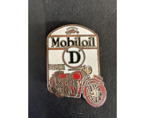 A rare Mobiloil 'D' grade enamel lapel badge with image of a motorcycle, stamped W.O. Lewis to the verso.