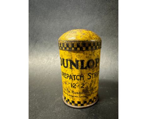 A small Dunlop patch strip tin with image of Mr Dunlop to the lid.