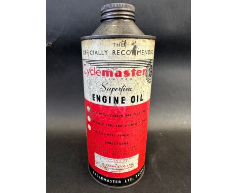 A Cyclemaster Superfine Engine Oil cylindrical quart can.