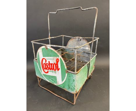 A Wakefield Castrol Motor Oil nine-division crate with two wrap-around enamel signs attached. 
