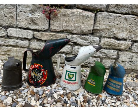 Five assorted oil measures including Silver Knight and BP Lubricants.