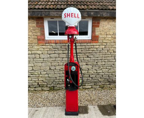 A Bowser hand-operated petrol pump, restored, with hose, nozzle and reproduction plastic petrol pump globe. 