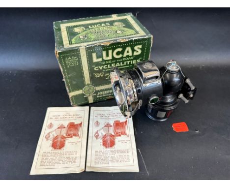 A rare Lucas 'Calcia King' no. 326 lamp in original box, brand new old stock. 