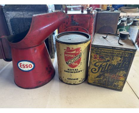 A Filtrate square can, a Royal Snowdrift 7lb tin and a large Esso measure.