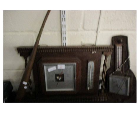 OAK FRAMED WALL MOUNTED BAROMETER WITH BARLEY TWIST COLUMNS TOGETHER WITH A COPPER POST HORN AND A FURTHER OAK FRAMED WALL BA