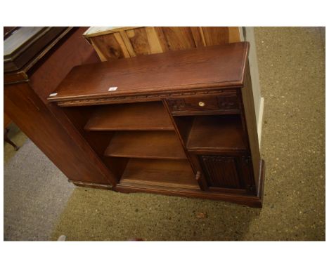 OLD CHARM BOOKCASE WITH TWO ADJUSTABLES SHELVES, WITH OPEN SHELF AND LINENFOLD PANELLED CUPBOARD DOOR