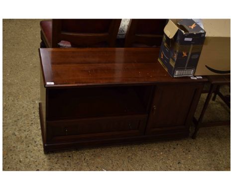 REPRODUCTION MAHOGANY TV CABINET WITH OPEN SHELF AND DROP FRONTED CUPBOARD DOOR BESIDE A PANELLED CUPBOARD DOOR