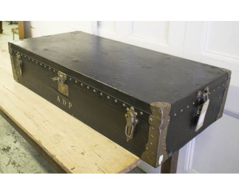 LOUIS VUITTON TRUNK, early 20th century canvas covered with metal bindings, locks stamped Louis Vuitton, paper label to inter
