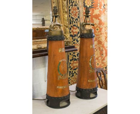 LAMP BASES, a pair, early 20th century adapted metal fire extinguishers in conical red and gold, 69cm H. (2)