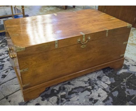 TRAVELLING TRUNK, 19th century Anglo Colonial teak and brass bound with rising lid and carrying handles, 11cm x 64cm x 52cm H