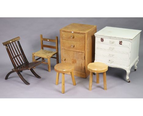 A white painted wooden small chest fitted four long drawers &amp; on short cabriole legs &amp; ceramic castors, 21” wide x 25