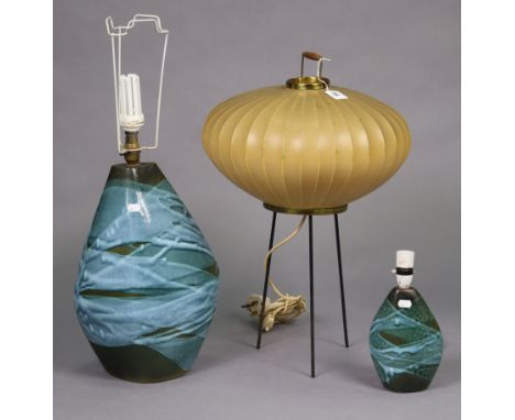 A retro-style table lamp base with a spherical shade &amp; on triform base, 24¼” high; &amp; two tremaen pottery table lamp b